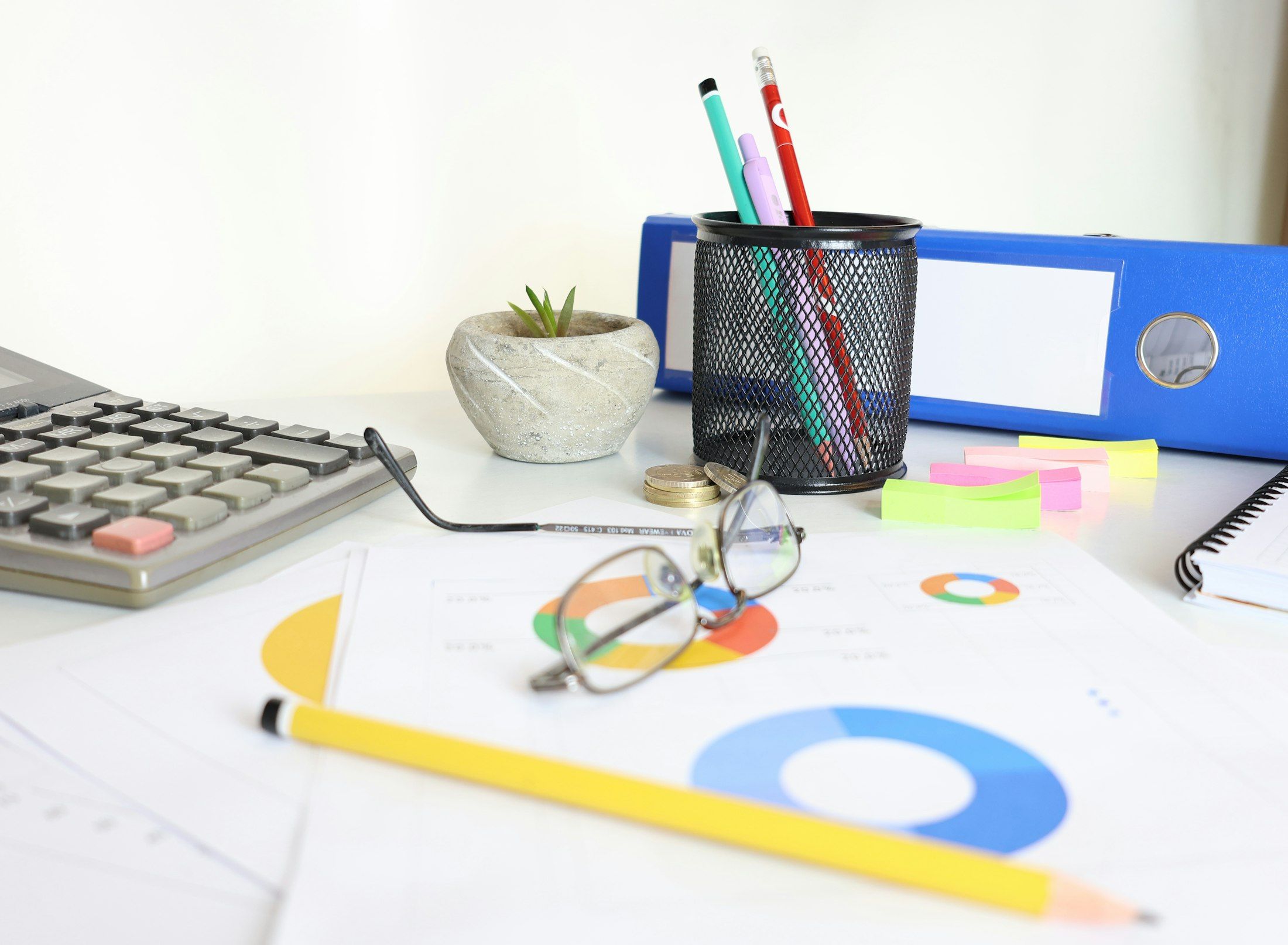 Calculator, glasses and VAT figures on a desk, VAT services Monetaire Accountants Worthing